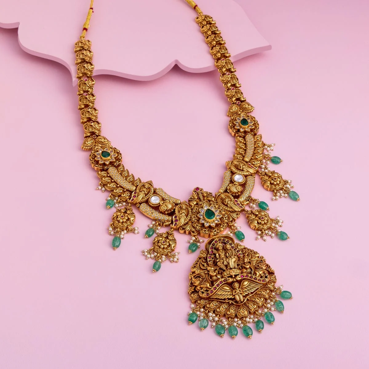 Swarna Pushpa Kempu Mala